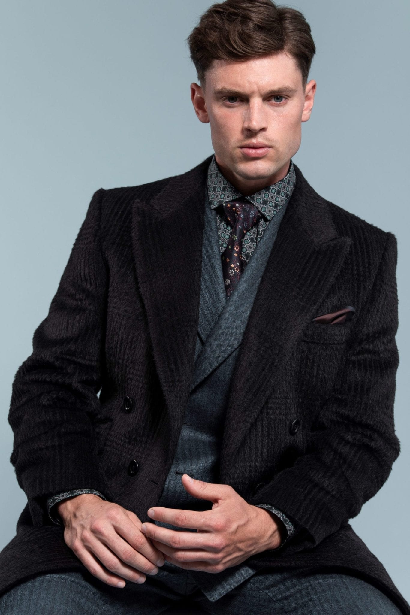 Model Jordan Clyde wearing a Custom-made wool mens overcoat
