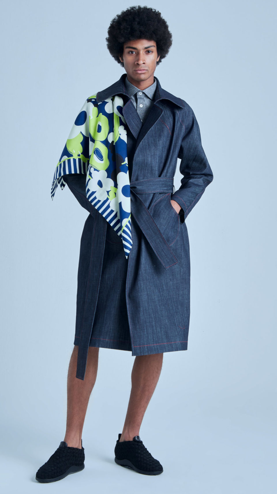 Model Mawen wearing a denim trench coat and a printed silk twill scarf.